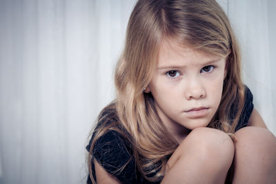 Portrait Of Sad Little Girl
